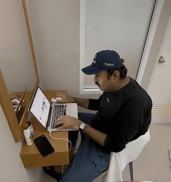 Digital Nomad Working On His Laptop